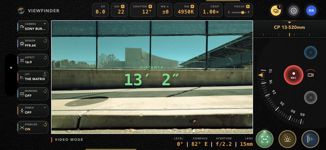 LiDAR measurement in the viewfinder frame reading 13 feet 2 inches to a wall, in Video mode with the camera armed