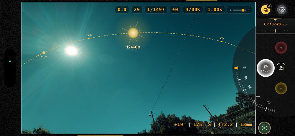 The sun path drawn across the sky in the frame with now, 12p and 2p marked on the arc, and the interface hidden