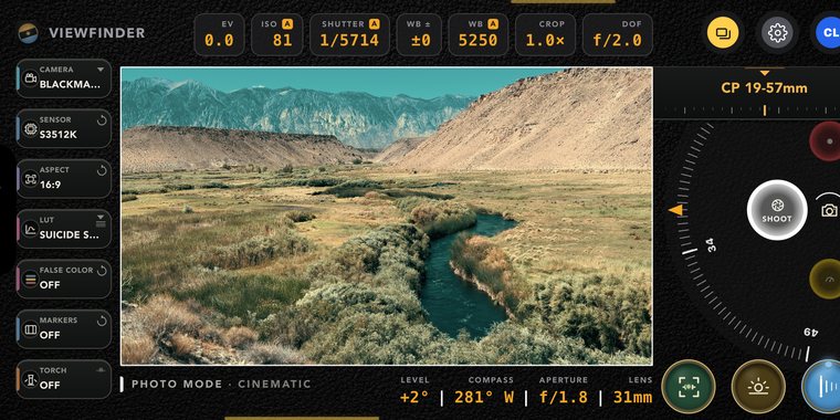 CamPlot Viewfinder framing a valley through a cinema camera and lens