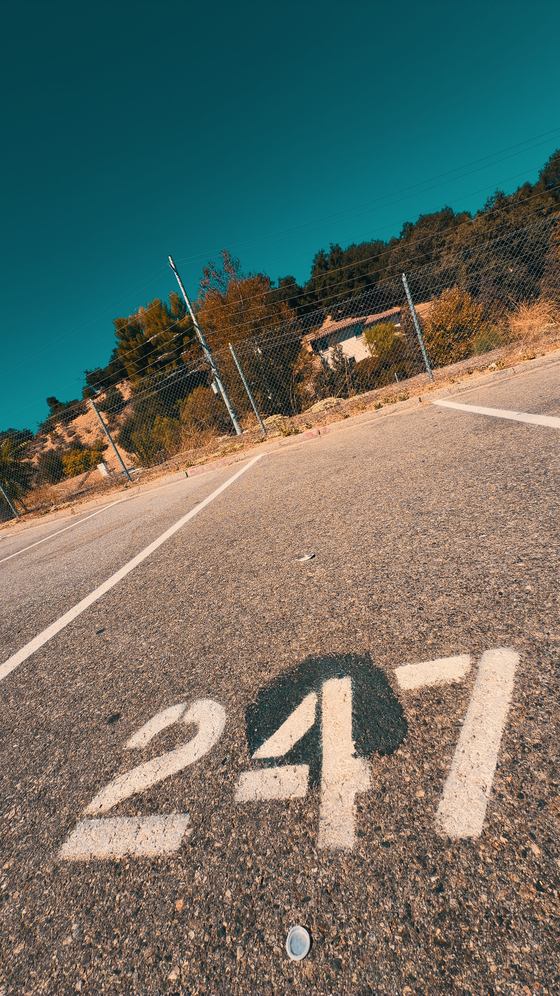The delivered file — a tall 9:16 photograph of a numbered parking bay with the look already applied